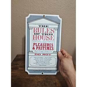 1991 Ande Rooney "The Rules of This House" Porcelain Enamel Metal Sign